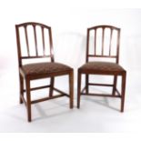 A set of five 18th century fruitwood dining chairs on square straight legs with stretchers