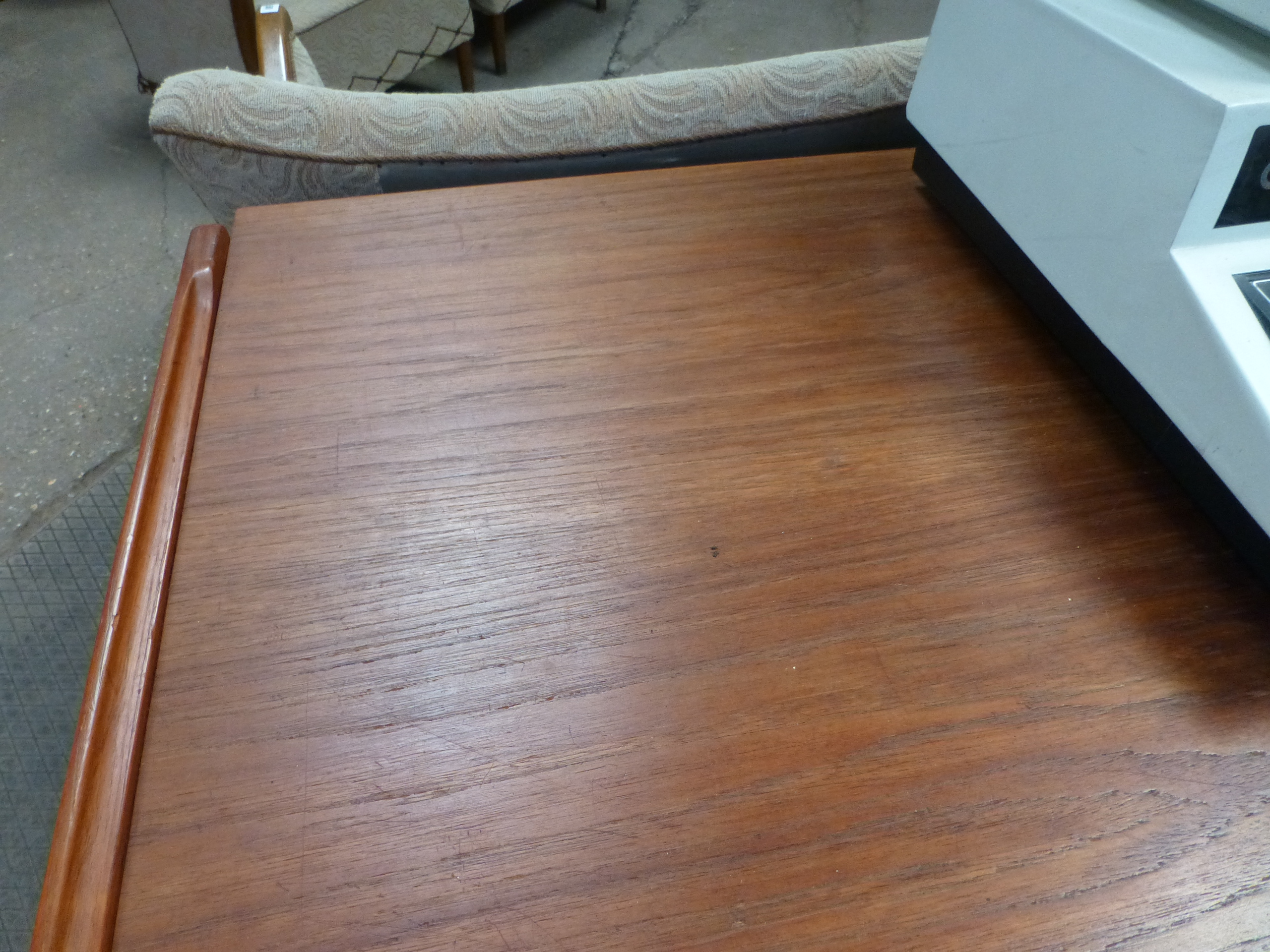 A 1970's teak desk with an arrangement on four drawer with a gallery section to the rear on square - Image 9 of 11