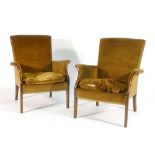 A pair of 1950/60's Parker Knoll upholstered armchairs with exposed beech frames
