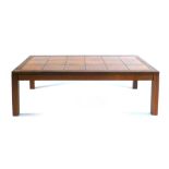 A 1960's rosewood and tile topped coffee table on square straight legs by Trioh, l.