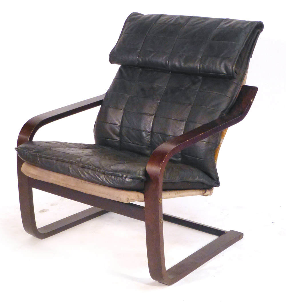 A 1970's bentwood high back vinyl lounge armchair CONDITION REPORT: some wear and