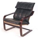 A 1970's bentwood high back vinyl lounge armchair CONDITION REPORT: some wear and