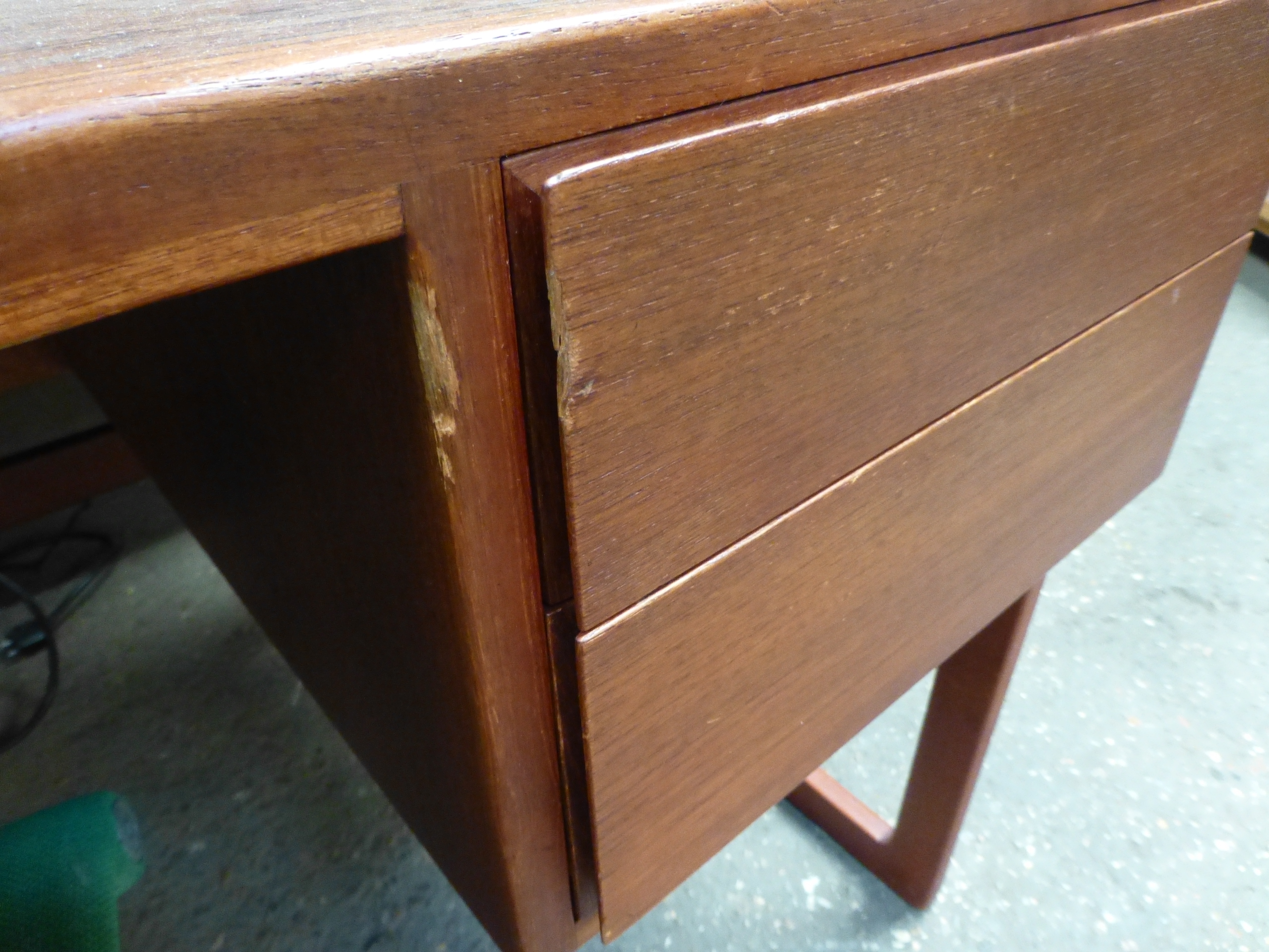 A 1970's teak desk with an arrangement on four drawer with a gallery section to the rear on square - Image 5 of 11
