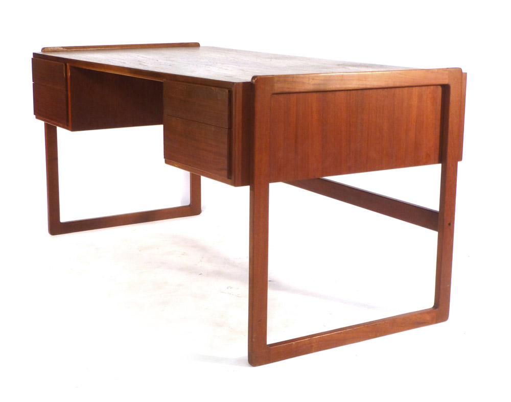 A 1970's teak desk with an arrangement on four drawer with a gallery section to the rear on square - Image 3 of 11