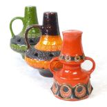Three West German pottery lamp bases decorated in green and orange glazes CONDITION