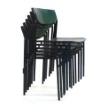 A set of sixteen green bentwood and steel framed stacking classroom/factory chairs together with