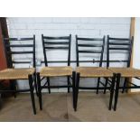 A set of four ebonised and rush seated chairs in the manner of Gio Ponti CONDITION