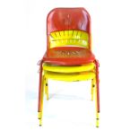 Three 1950/60's industrial red and yellow painted metal stacking and interlocking chairs