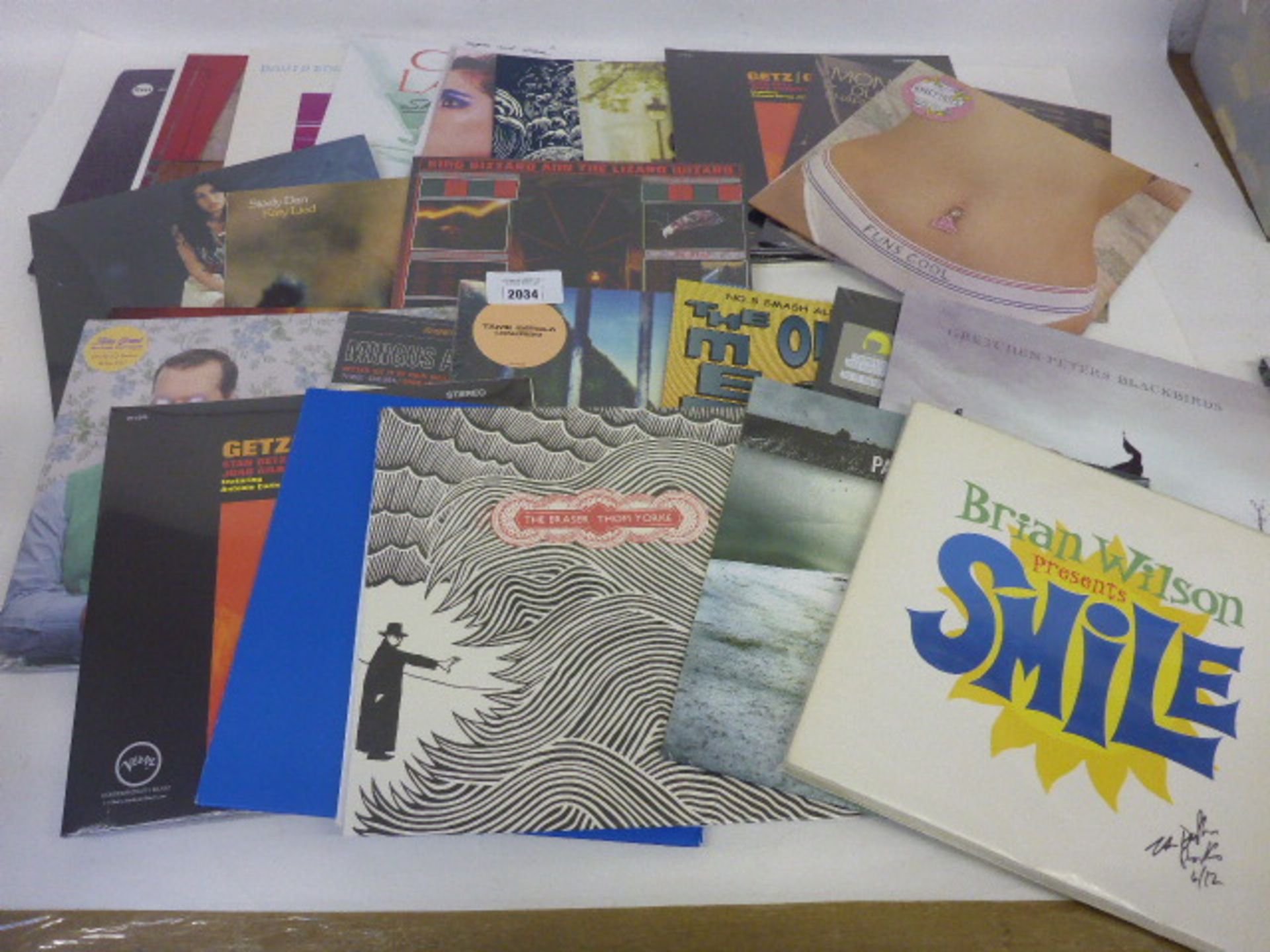 Collection of LP records including Amy Winehouse, Cyndi Lauper, David Bowie, Gomez, John Grant,