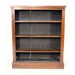 A late 19th century mahogany open fronted adjustable bookcase on a plinth base, w.