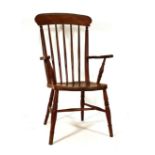 A Victorian beech and elm seated spindle back armchair CONDITION REPORT: Wear