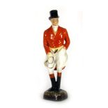 A Royal Doulton figure modelled as HRH Prince of Wales in hunting attire, Model No. HN1217, h. 18.