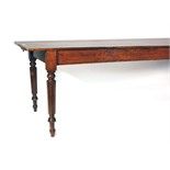A stained oak refectory-type table on turned legs, l.