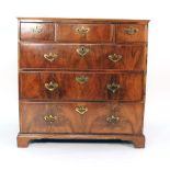 An 18th century walnut and crossbanded chest of three small over three long graduated drawers on