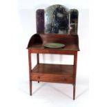 A 19th century mahogany washstand with a pottery bowl, later surmounted by a tri-fold mirror, w.
