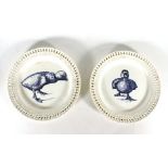 A pair of Minton caneware ribbon plates, both transfer printed with an image of a duckling, d. 22.