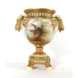 A Royal Worcester vase of urn shaped form,