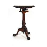 An 18th century-style beech tilt-top side table on three splayed legs with ball and claw feet, w.