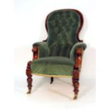 A Victorian mahogany and button upholstered armchair on turned legs CONDITION REPORT: