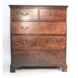 A George III mahogany oversized chest of two short over three long graduated drawers on bracket