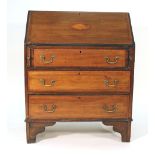 An Edwardian mahogany and inlaid bureau,