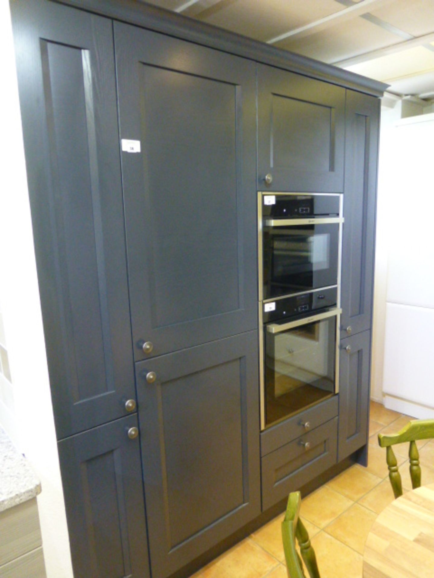 Masterclass Kitchen display approx. 180cm in Midnight blue with sliding storage and a Neff double