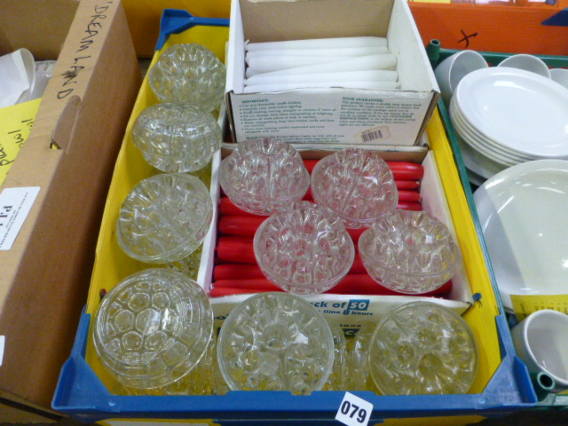 Plastic tray of candle sticks and candle stick holders