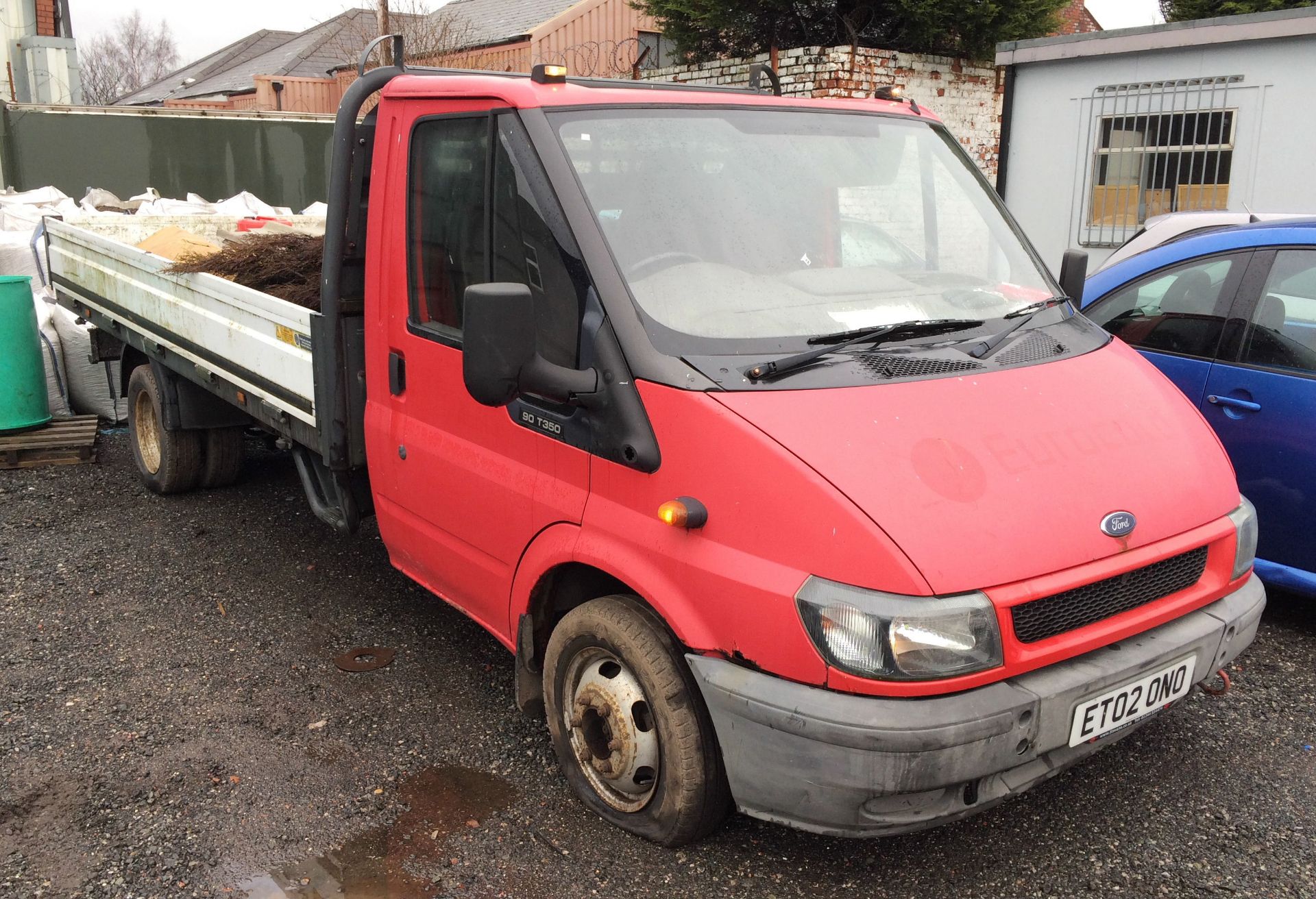 A Ford Transit 90T350 TD LWB RWD Dropside Truck Reg. No.ET02ONO, first registered 25-7-2002,