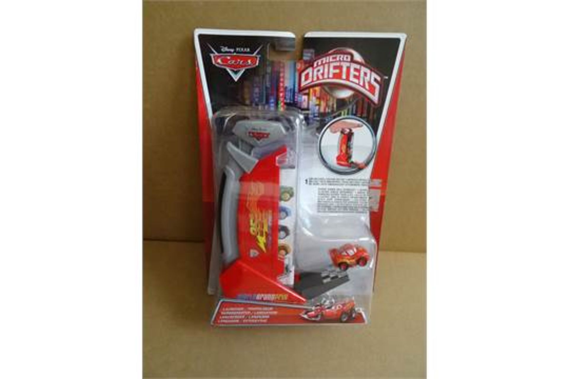 12 x Disney Pixar Cars Mattel Micro Drifters Launcer. Includes 1 car. Brand new and Packaged