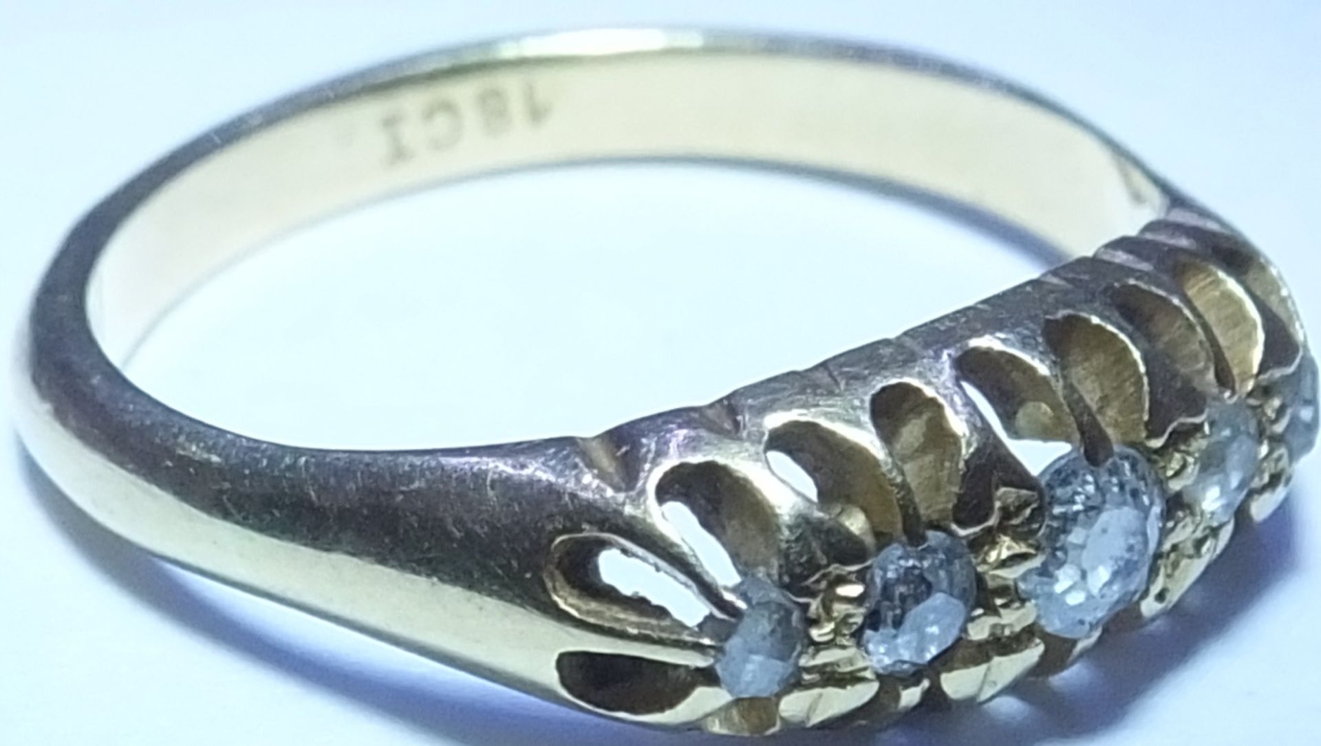 An early 20th century 18ct gold five-stone ring. Designed as a graduated circular-cut diamond - Image 3 of 3