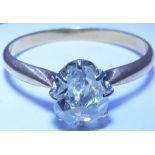 A diamond single-stone ring. The rose-cut diamond, to the tapered shoulders and plain band. Ring