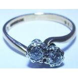 A  9ct gold diamond rings. Two brilliant cut diamonds mounted in 9ct. Total carat weight .2 cts -