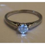 9CT WHITE GOLD SINGLE SOLITAIRE RING - TOTAL DIAMOND CONTENT APPROX: 0.30 CT.