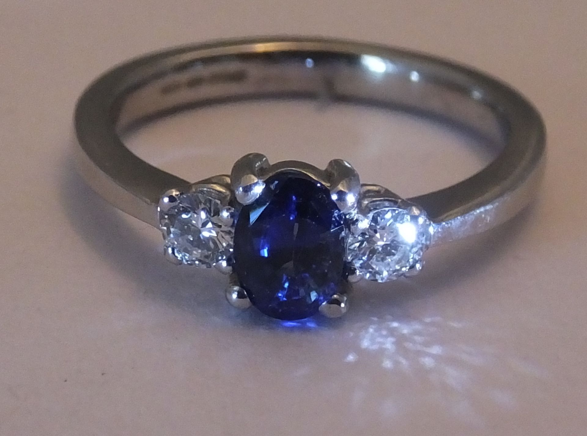 18CT WHITE GOLD & ROYAL BLUE SAPPHIRE & DIAMOND TRILOGY RING- SIZE N - TOTAL DIAMOND CONTENT APPROX: