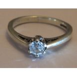 An 9ct White gold Diamond Ring. Size 0. A brilliant cut solitaire diamond of around 0.33 carat.