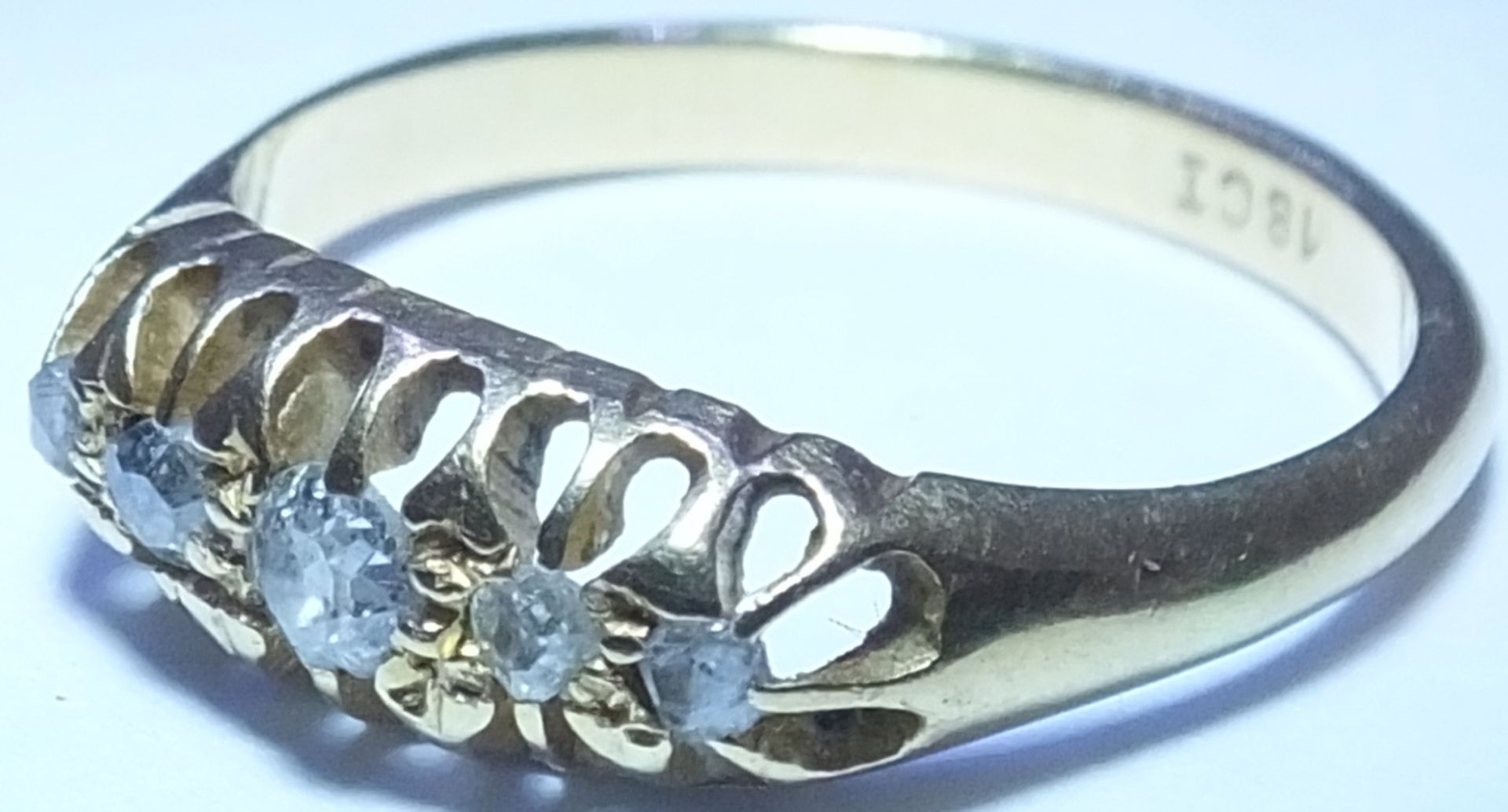 An early 20th century 18ct gold five-stone ring. Designed as a graduated circular-cut diamond - Image 2 of 3