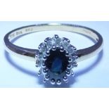 A 9ct gold and sapphire diamond ring.  1.6grms - size M.