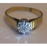 An 18ct illusion set diamond solitaire ring - size p/q