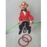 Vintage toy - balancing tightrope clown on unicycle. Needs a very small repair to unicycle but