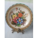 Beautifully handpainted art pottery wall plate, signed by the artist and signed to underside. In