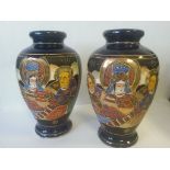 Pair of oriental enamelled vases, both approx 17cm high. Marked "Foreign" to base. Condition - good,