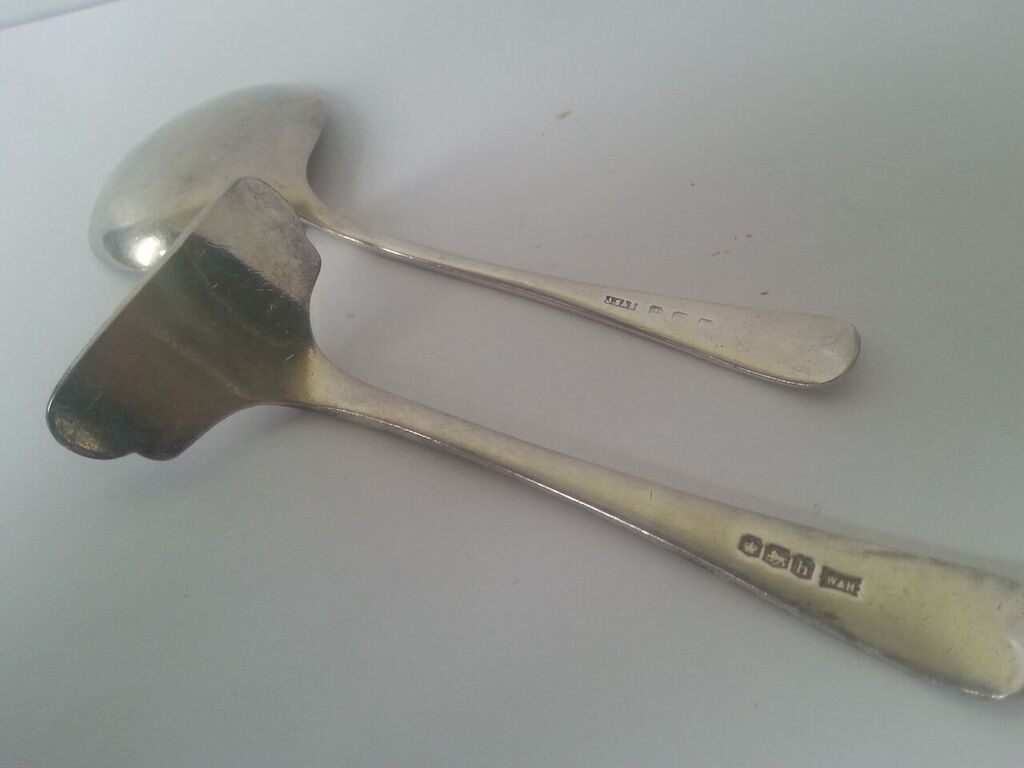 Silver baby spoon and pusher. The pusher hallmarked Sheffield 1920s made by Walker and Hall, the - Image 2 of 2