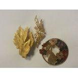 Group of gold tone vintage brooches