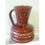 Sylvac brown glaze handled jug or ewer. Impressed marks to base. Condition - Good, no obvious