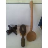 Collection of treen or wooden items to include hairbrush with white metal cartouche, vintage kitchen