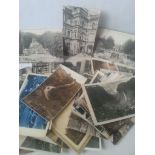 Collection of approximately 50 black & white topographical postcards, mostly French.