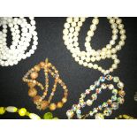 A collection of vintage beads necklaces and stone necklaces