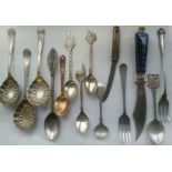 Group of antique and vintage cutlery to include hindu spoon, honey advertising spoon, letter openers