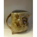 Quirky 1970s studio art pottery jug with mottle glaze. Signed to underside. Good condition, an