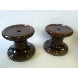 Pair of brown glaze pottery vase display stands, both at approximately 9cm tall and 9cm diameter